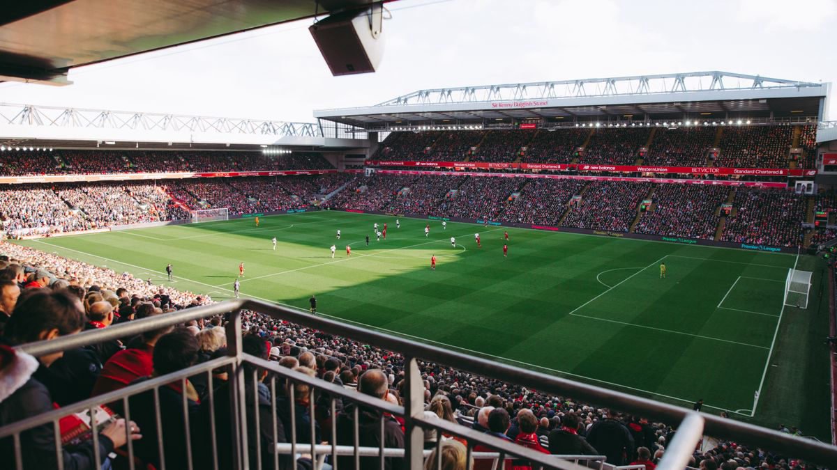 Full stadium crowd watching a soccer match