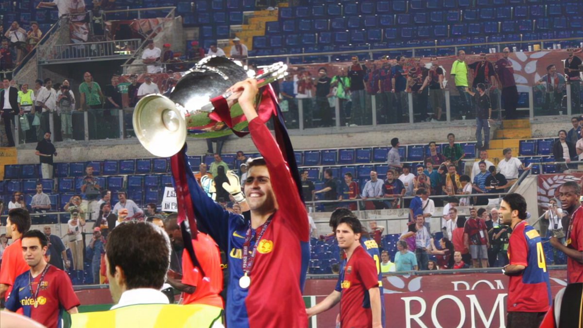 Barcelona players celebrating the 2009 Champions League title with the trophy