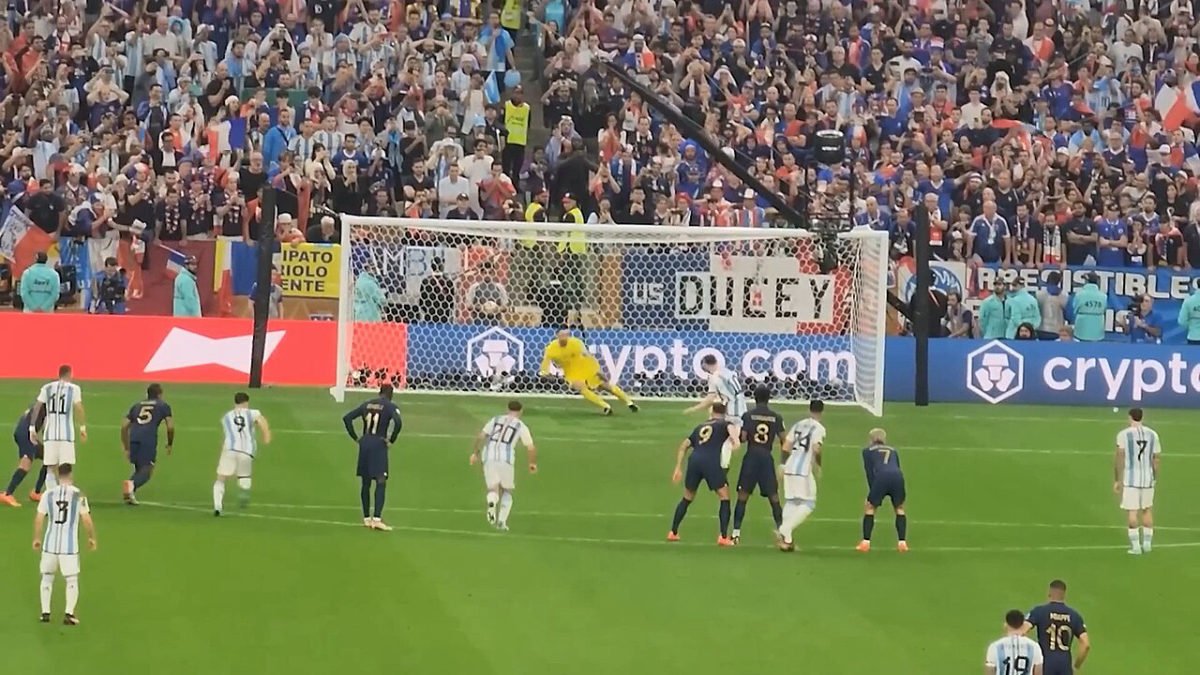 Messi scoring a penalty against France in the 2022 World Cup final