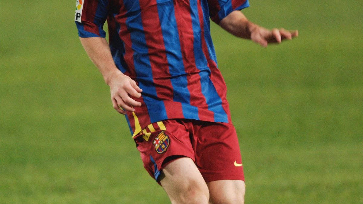A teenage Messi playing for FC Barcelona against Malaga in 2005