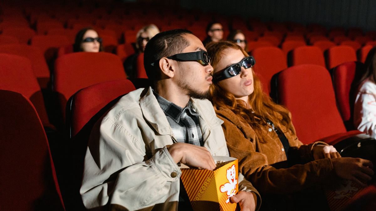 Couple watching a film in a cinema